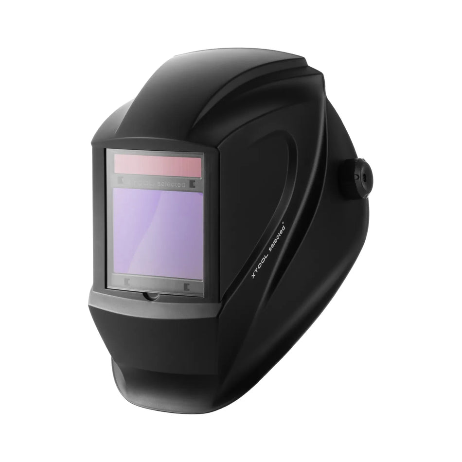 Black welding helmet with a clear visor on a white background